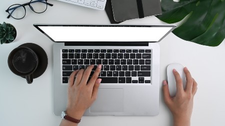 above-view-of-woman-working-with-computer-laptop-o-2024-12-04-03-37-31-utc
