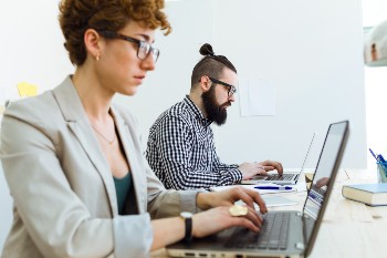 business-people-working-in-the-office-with-laptop-2023-11-27-04-52-46-utc