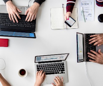 people-hands-working-using-laptop-on-white-table-2023-11-27-05-01-34-utc